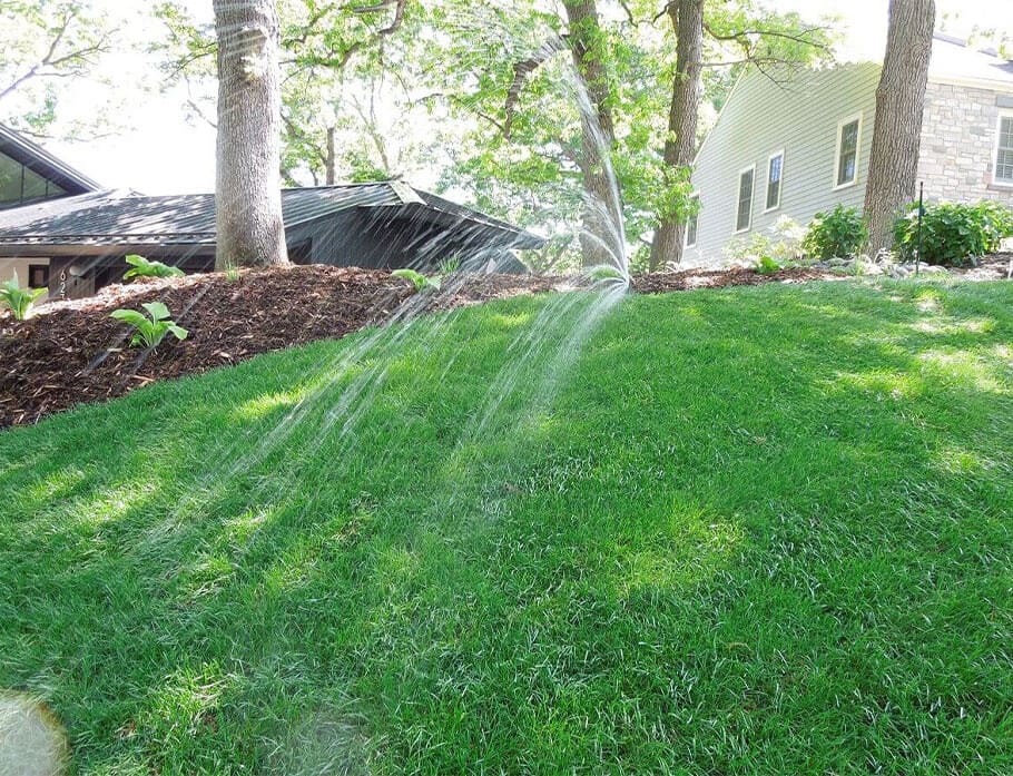 irrigation sprinkler in garden - High Prairie Landscape Group