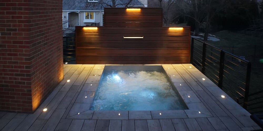 outdoor pool with paver patio Kansas City
